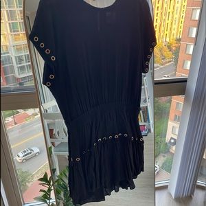 Black dress with cinched elastic waist and double layered skirt. Size M